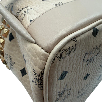 https://cdn.shopify.com/s/files/1/0564/9376/8855/files/MCM_Rucksack_Stark_medium_visetos_beige_vintage8399.webp?v=1781108985