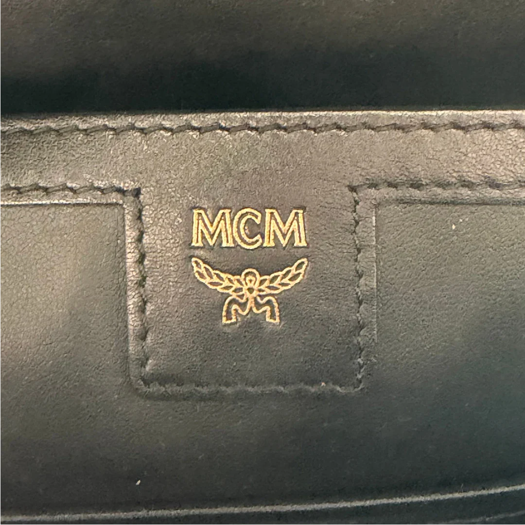 https://cdn.shopify.com/s/files/1/0564/9376/8855/files/MCM_Rucksack_Stark_medium_visetos_beige_vintage8406.webp?v=1781108985