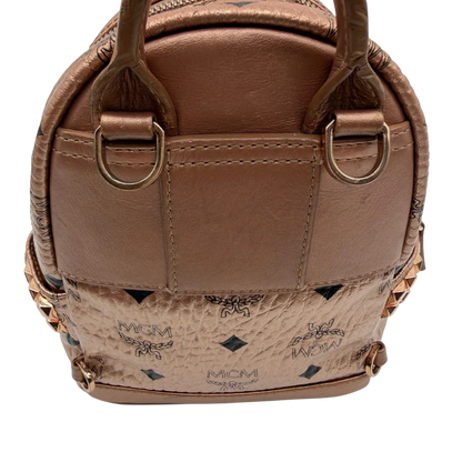 https://cdn.shopify.com/s/files/1/0564/9376/8855/files/MCM_Rucksack_Stark_mini_visetos_rosegold_10.webp?v=1781855456