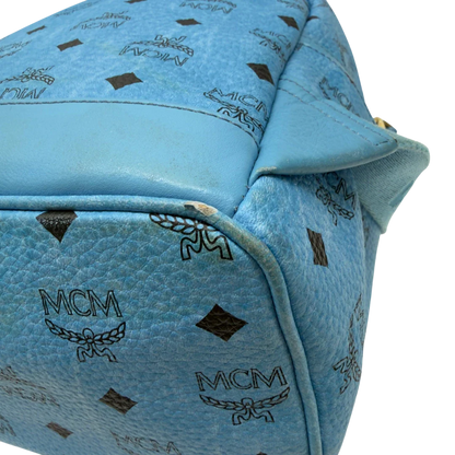 https://cdn.shopify.com/s/files/1/0564/9376/8855/files/MCM_Rucksack_Stark_mit_Nieten_medium_visetos_Munich_Blue_9.webp?v=1783514032