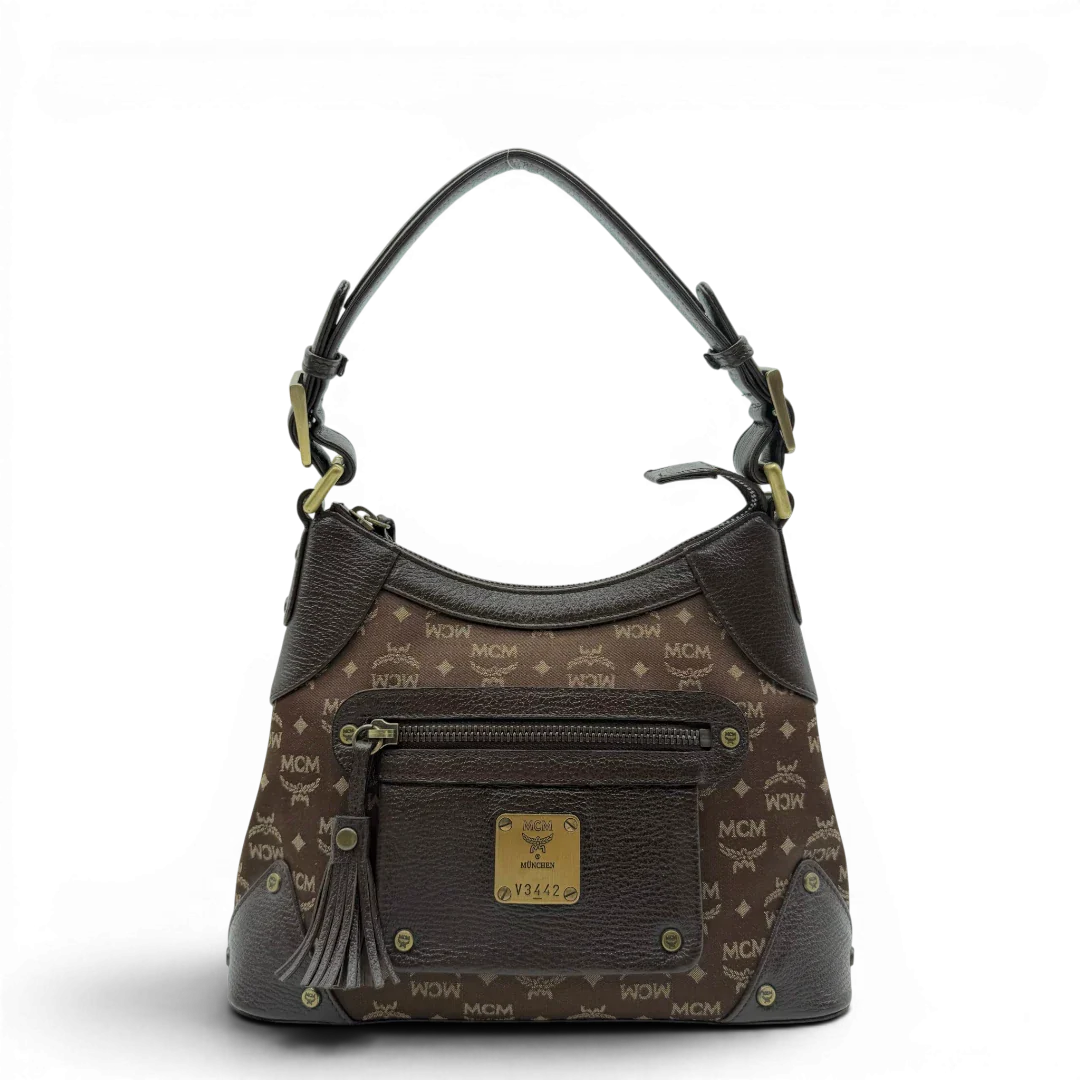 https://cdn.shopify.com/s/files/1/0564/9376/8855/files/MCM_Schultertasche_Hobo_monogram_braun_1.webp?v=1781713302