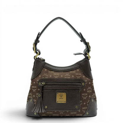 https://cdn.shopify.com/s/files/1/0564/9376/8855/files/MCM_Schultertasche_Hobo_monogram_braun_1.webp?v=1781713302