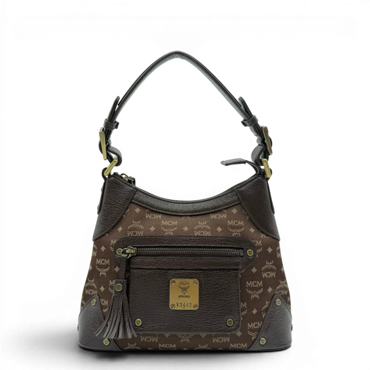 https://cdn.shopify.com/s/files/1/0564/9376/8855/files/MCM_Schultertasche_Hobo_monogram_braun_1.webp?v=1781713302