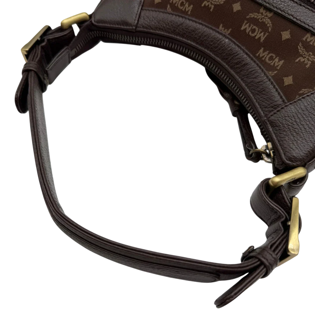 https://cdn.shopify.com/s/files/1/0564/9376/8855/files/MCM_Schultertasche_Hobo_monogram_braun_10.webp?v=1781713302