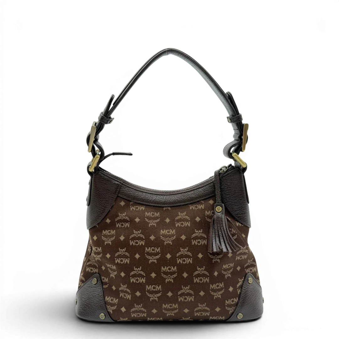 https://cdn.shopify.com/s/files/1/0564/9376/8855/files/MCM_Schultertasche_Hobo_monogram_braun_2.webp?v=1781713302