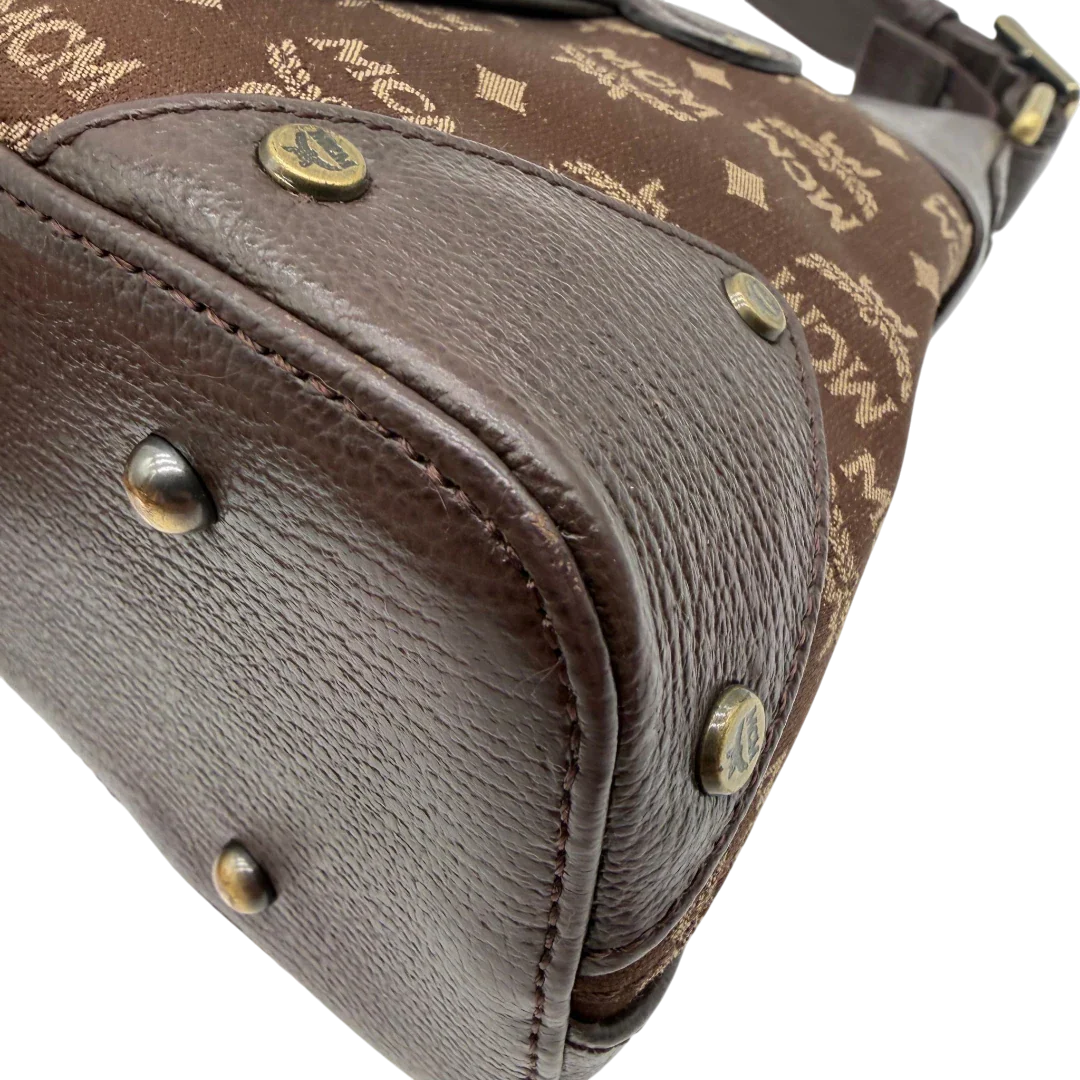 https://cdn.shopify.com/s/files/1/0564/9376/8855/files/MCM_Schultertasche_Hobo_monogram_braun_6.webp?v=1781713303