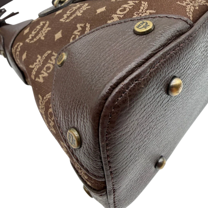 https://cdn.shopify.com/s/files/1/0564/9376/8855/files/MCM_Schultertasche_Hobo_monogram_braun_7.webp?v=1781713303