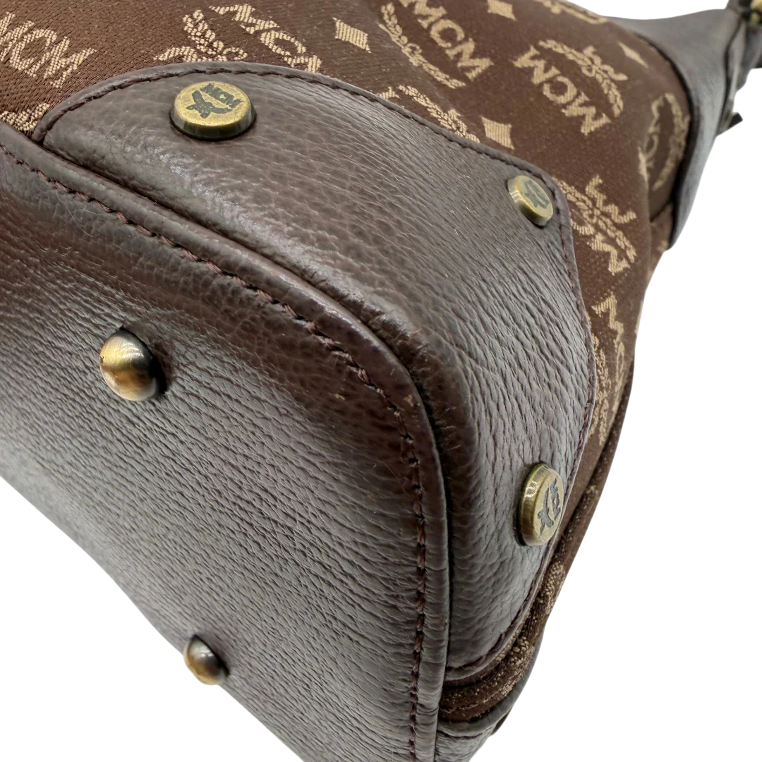 https://cdn.shopify.com/s/files/1/0564/9376/8855/files/MCM_Schultertasche_Hobo_monogram_braun_8.webp?v=1781713303