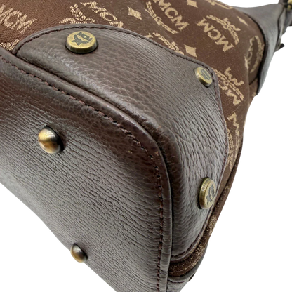 https://cdn.shopify.com/s/files/1/0564/9376/8855/files/MCM_Schultertasche_Hobo_monogram_braun_8.webp?v=1781713303