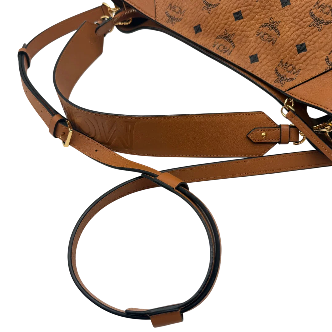 https://cdn.shopify.com/s/files/1/0564/9376/8855/files/MCM_Schultertasche_Hobo_visetos_braun_10.webp?v=1782377855