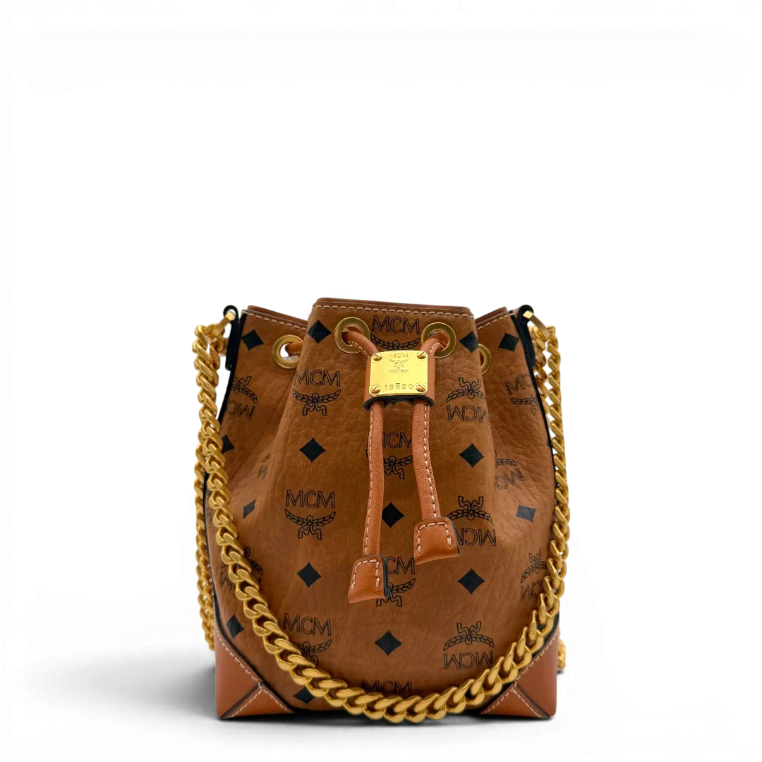 https://cdn.shopify.com/s/files/1/0564/9376/8855/files/MCM_Schultertasche_Soft_Berlin_Bucket_small_visetos_braun_1.webp?v=1782313434