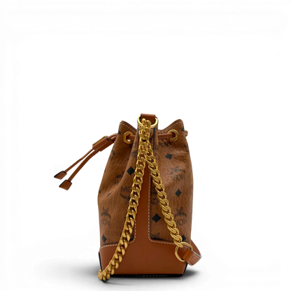 https://cdn.shopify.com/s/files/1/0564/9376/8855/files/MCM_Schultertasche_Soft_Berlin_Bucket_small_visetos_braun_3.webp?v=1782313434