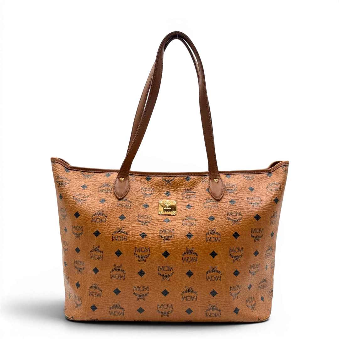 https://cdn.shopify.com/s/files/1/0564/9376/8855/files/MCM_Shopper_Anya_vintage_visetos_braun_1.webp?v=1781713164