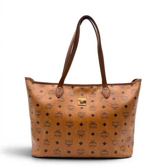 https://cdn.shopify.com/s/files/1/0564/9376/8855/files/MCM_Shopper_Anya_vintage_visetos_braun_1.webp?v=1781713164