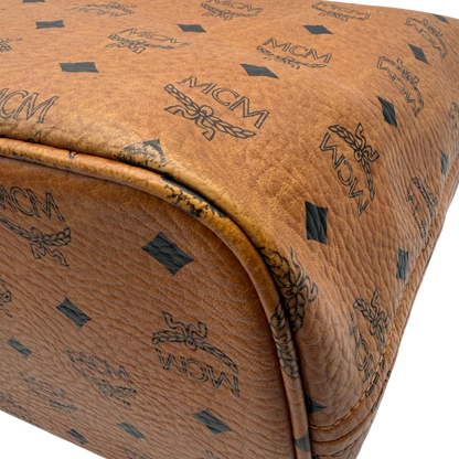 https://cdn.shopify.com/s/files/1/0564/9376/8855/files/MCM_Shopper_Anya_vintage_visetos_braun_8.webp?v=1781713164