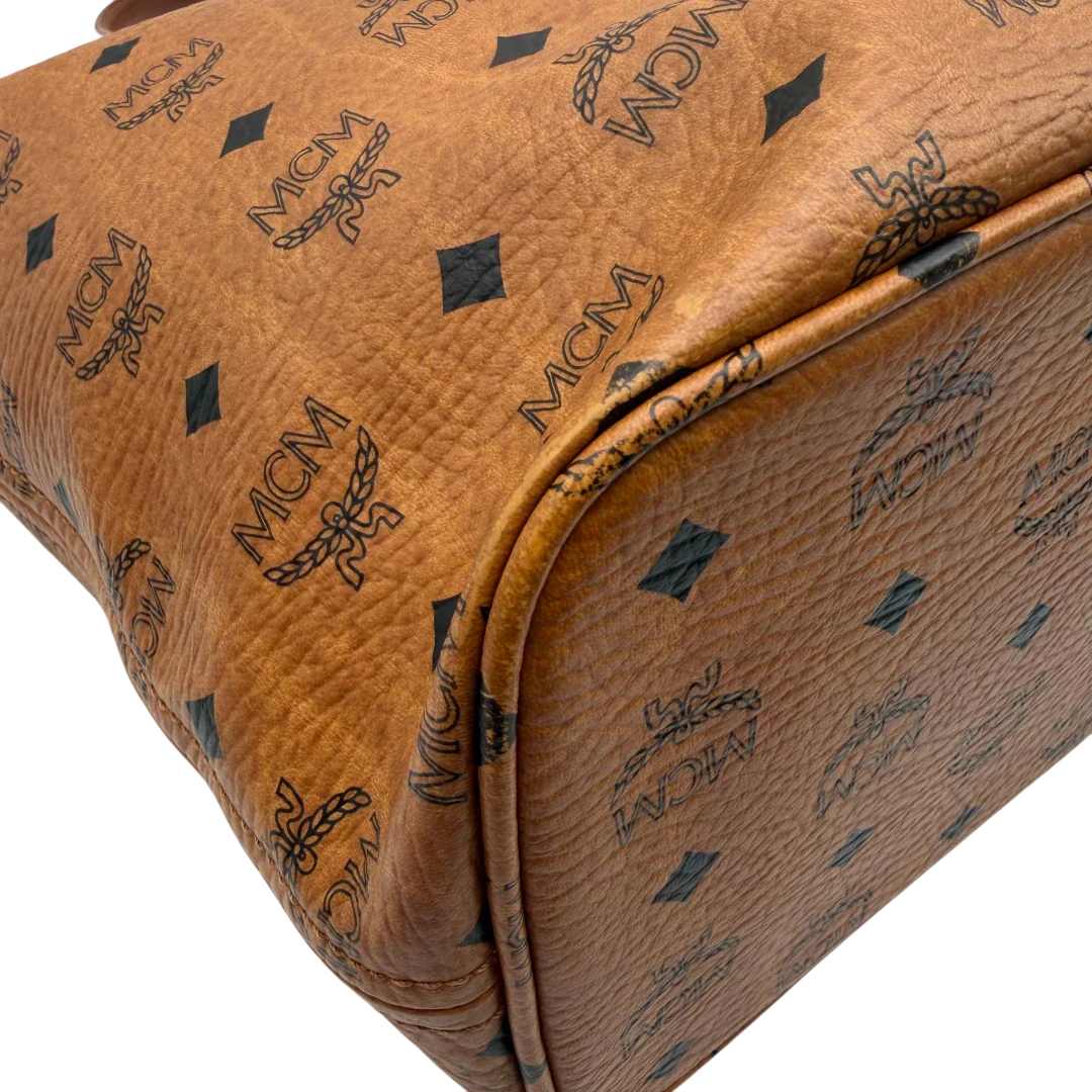 https://cdn.shopify.com/s/files/1/0564/9376/8855/files/MCM_Shopper_Anya_vintage_visetos_braun_9.webp?v=1781713164