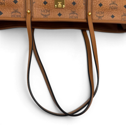 https://cdn.shopify.com/s/files/1/0564/9376/8855/files/MCM_Shopper_Anya_visetos_braun_vintage2359.webp?v=1779969783