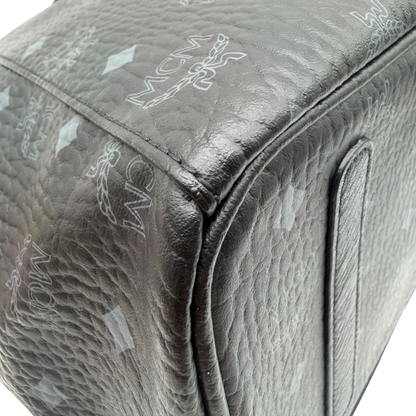 https://cdn.shopify.com/s/files/1/0564/9376/8855/files/MCM_Shopper_Liz_mit_Pochette_visetos_schwarz_vintage8572.webp?v=1781108345