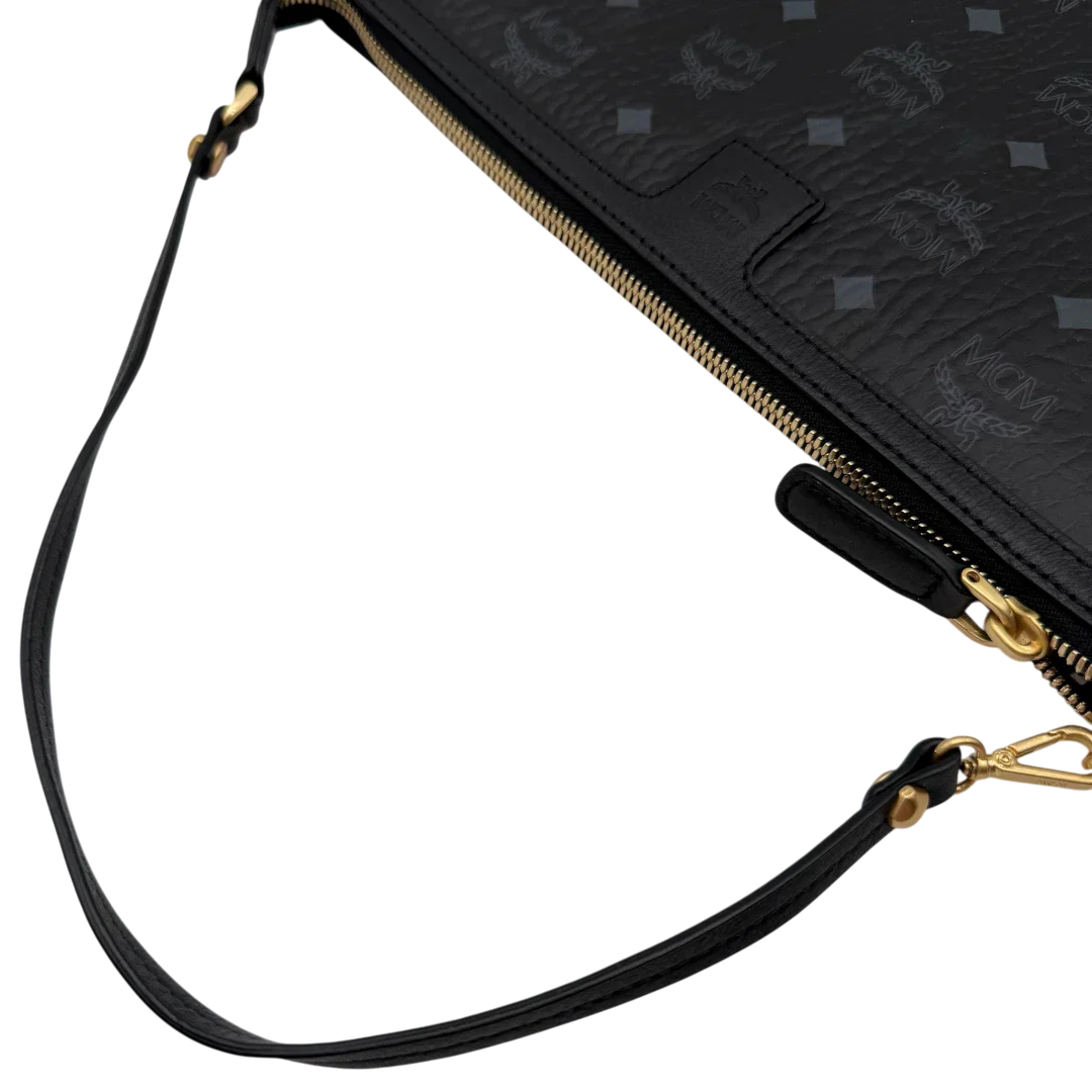 https://cdn.shopify.com/s/files/1/0564/9376/8855/files/MCM_Shopper_Liz_mit_Pochette_visetos_schwarz_vintage8584.webp?v=1781108345