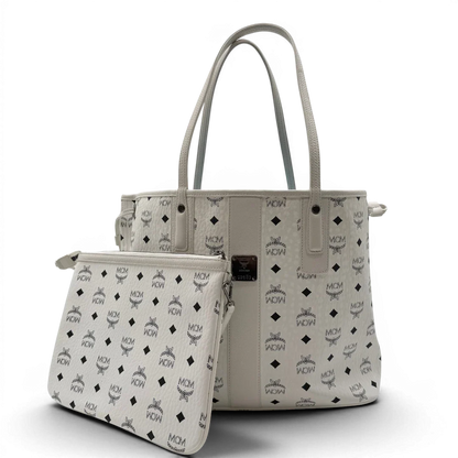 https://cdn.shopify.com/s/files/1/0564/9376/8855/files/MCM_Shopper_Liz_mit_Pochette_visetos_weiss_1.webp?v=1782313118