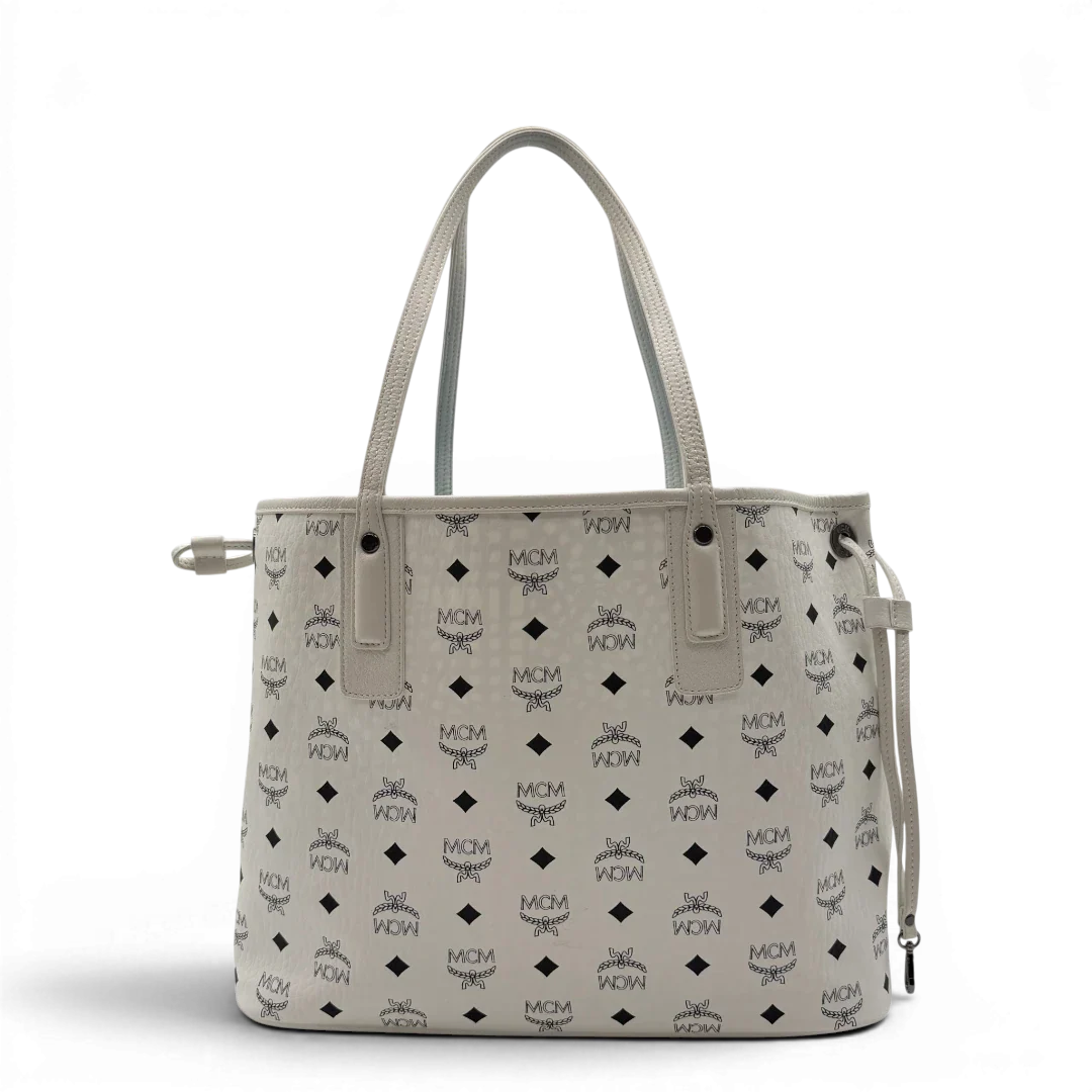 https://cdn.shopify.com/s/files/1/0564/9376/8855/files/MCM_Shopper_Liz_mit_Pochette_visetos_weiss_2.webp?v=1782313118