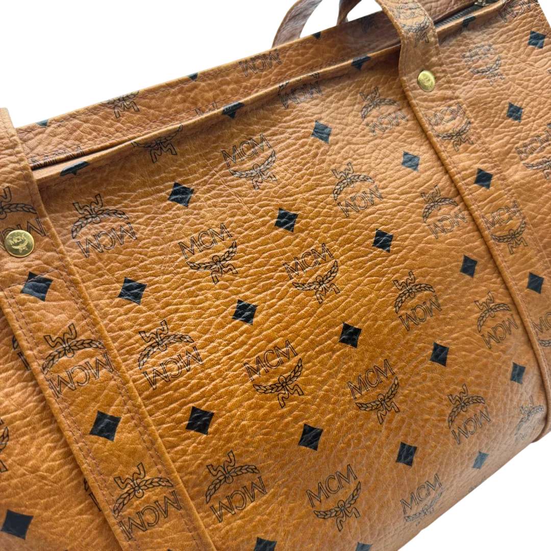 https://cdn.shopify.com/s/files/1/0564/9376/8855/files/MCM_Tote_bag_vintage5647_6455af59-5e03-44e2-9b9c-0c0a2e02cab0.webp?v=1777480779