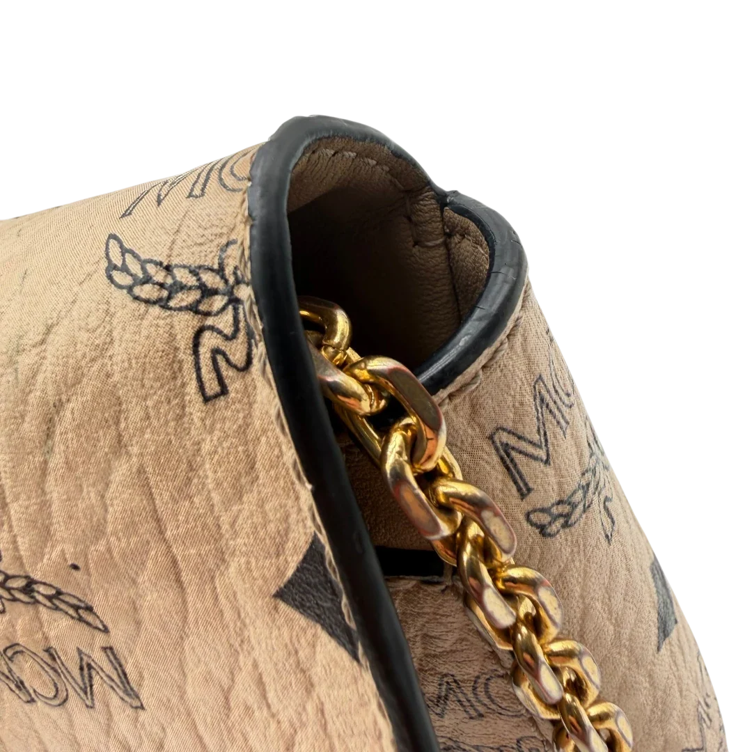 https://cdn.shopify.com/s/files/1/0564/9376/8855/files/MCM_Umhangetasche_Millie_Flap_visetos_beige_14.webp?v=1784795374