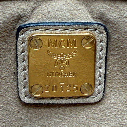 https://cdn.shopify.com/s/files/1/0564/9376/8855/files/MCM_Umhangetasche_Millie_Flap_visetos_beige_17.webp?v=1784795374