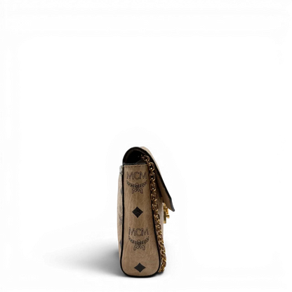 https://cdn.shopify.com/s/files/1/0564/9376/8855/files/MCM_Umhangetasche_Millie_Flap_visetos_beige_6.webp?v=1784795373
