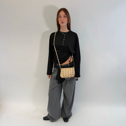https://cdn.shopify.com/s/files/1/0564/9376/8855/files/MCM_Umhangetasche_Millie_beige_1.jpg?v=1784794941