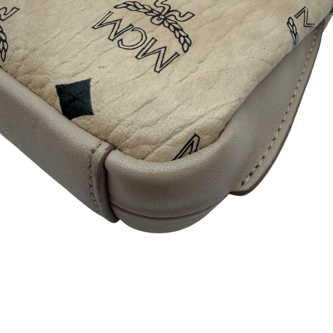 https://cdn.shopify.com/s/files/1/0564/9376/8855/files/MCM_Umhangetasche_Millie_beige_10.webp?v=1784794941