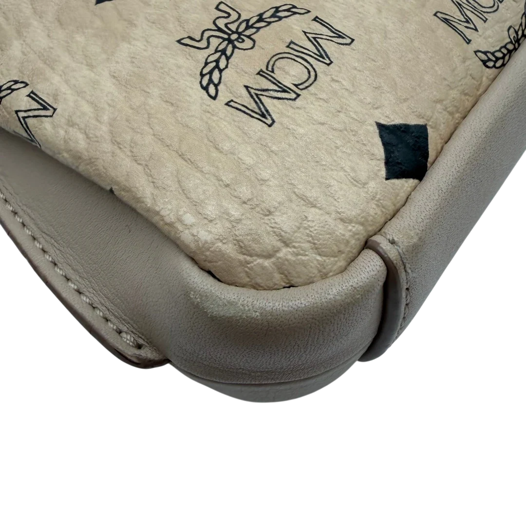 https://cdn.shopify.com/s/files/1/0564/9376/8855/files/MCM_Umhangetasche_Millie_beige_11.webp?v=1784794941