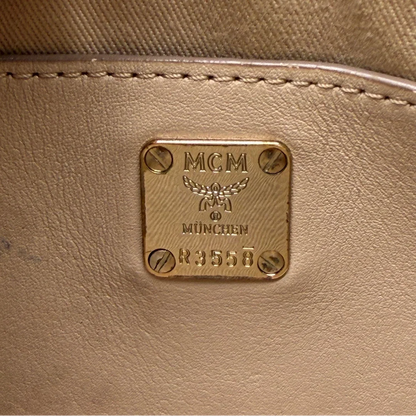 https://cdn.shopify.com/s/files/1/0564/9376/8855/files/MCM_Umhangetasche_Millie_beige_17.webp?v=1784794941