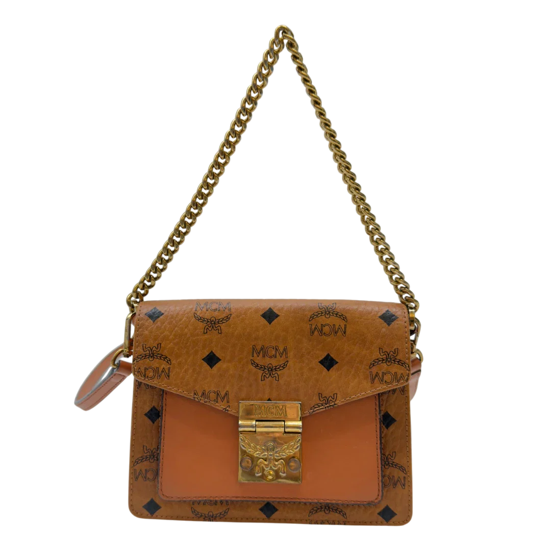 https://cdn.shopify.com/s/files/1/0564/9376/8855/files/MCM_Umhangetasche_Patricia_mit_Umhangegurt_visetos_braun_2.webp?v=1783513860