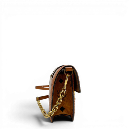 https://cdn.shopify.com/s/files/1/0564/9376/8855/files/MCM_Umhangetasche_Tracy_Wallet_on_Chain_visetos_braun_2.webp?v=1784240372