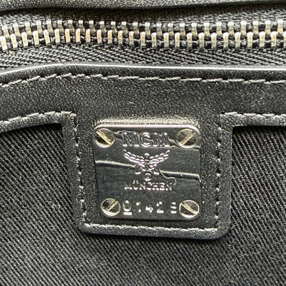 https://cdn.shopify.com/s/files/1/0564/9376/8855/files/MCM_Umhangetasche_Tracy_Wallet_on_Chain_visetos_schwarz_13.webp?v=1781855633