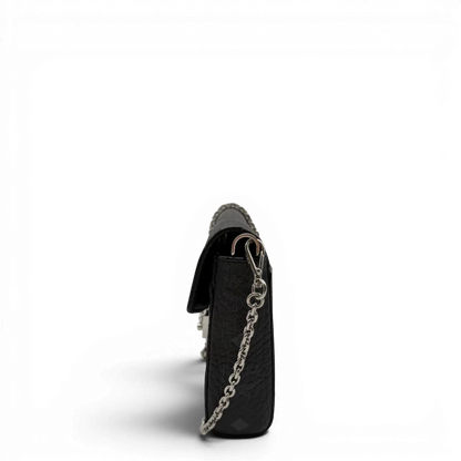 https://cdn.shopify.com/s/files/1/0564/9376/8855/files/MCM_Umhangetasche_Tracy_Wallet_on_Chain_visetos_schwarz_3.webp?v=1781855632