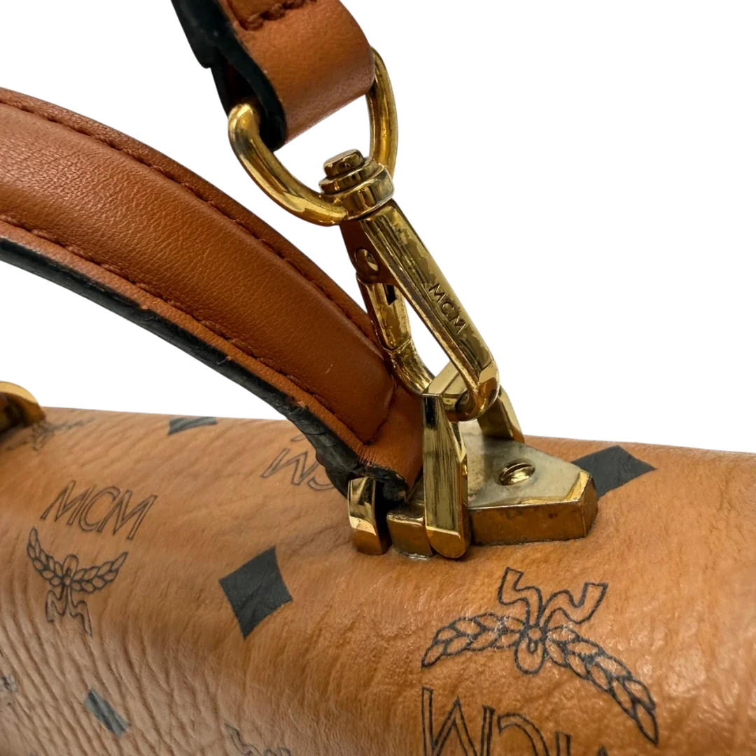 https://cdn.shopify.com/s/files/1/0564/9376/8855/files/MCM_Umhangetasche_Tracy_small_Satchel_visetos_braun_15.webp?v=1784794735