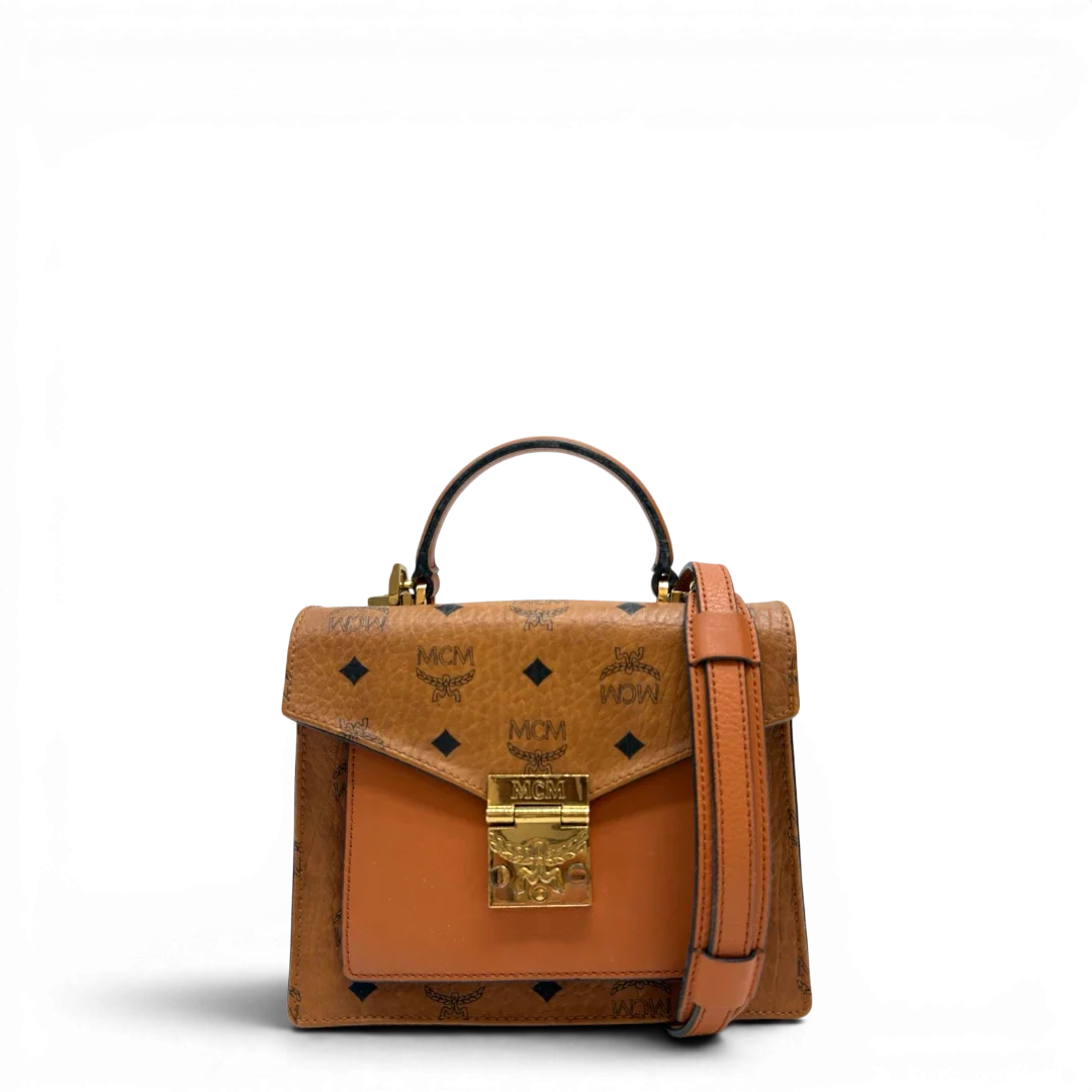 https://cdn.shopify.com/s/files/1/0564/9376/8855/files/MCM_Umhangetasche_Tracy_small_Satchel_visetos_braun_4.webp?v=1784794734