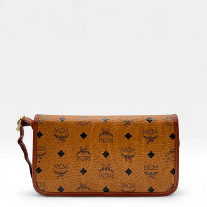 https://cdn.shopify.com/s/files/1/0564/9376/8855/files/MCM_Umhangetasche_monogram_braun_second_hand_designer_MCM_crossbody2075.webp?v=1753351676