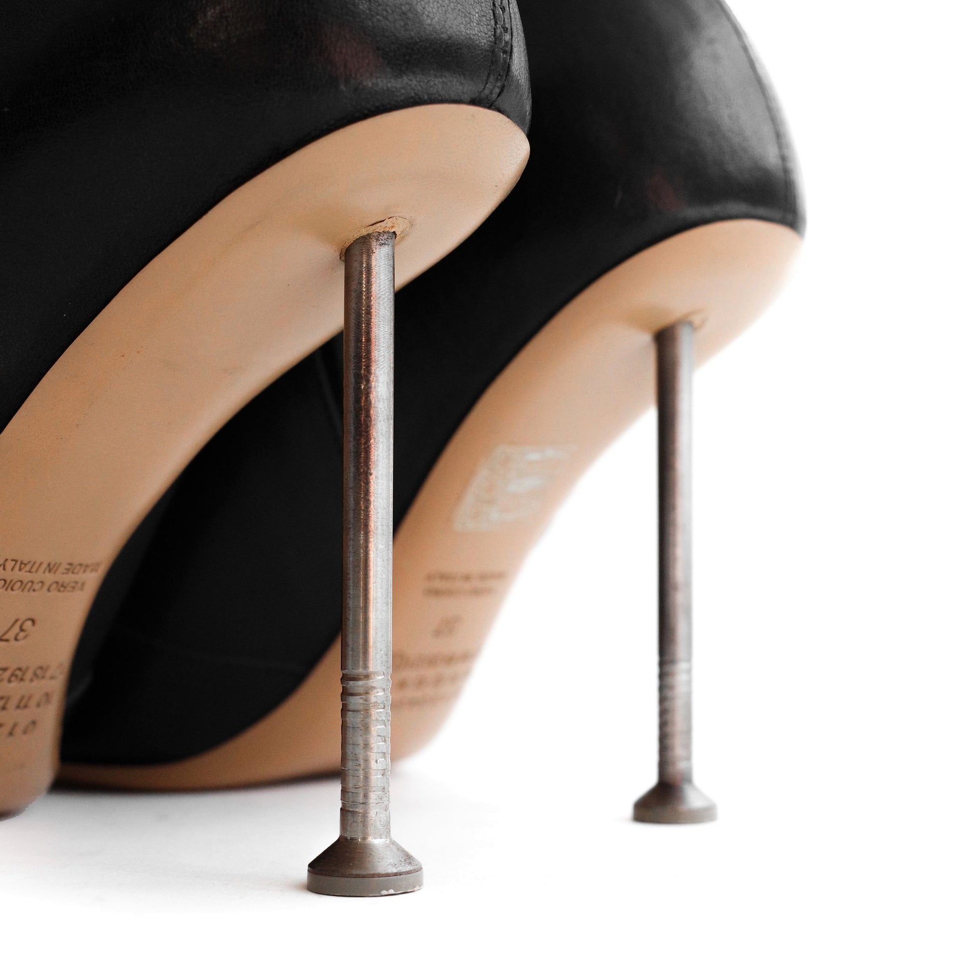 Maison Martin Margiela FW 2008 leather ankle boots with nail stiletto heels and round toe. Size EU 37 / UK 4. Available at Artefact Archive.
