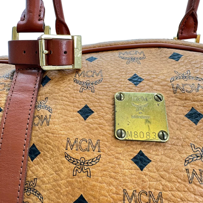https://cdn.shopify.com/s/files/1/0564/9376/8855/files/Mcm_Reisetasche_55_mit_Schultergurt_Visetos_braun_vintage_2829.webp?v=1772707822