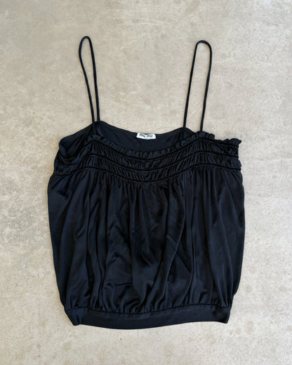 Miu Miu Black Acetate Nylon Blend Top – S-on a concrete background