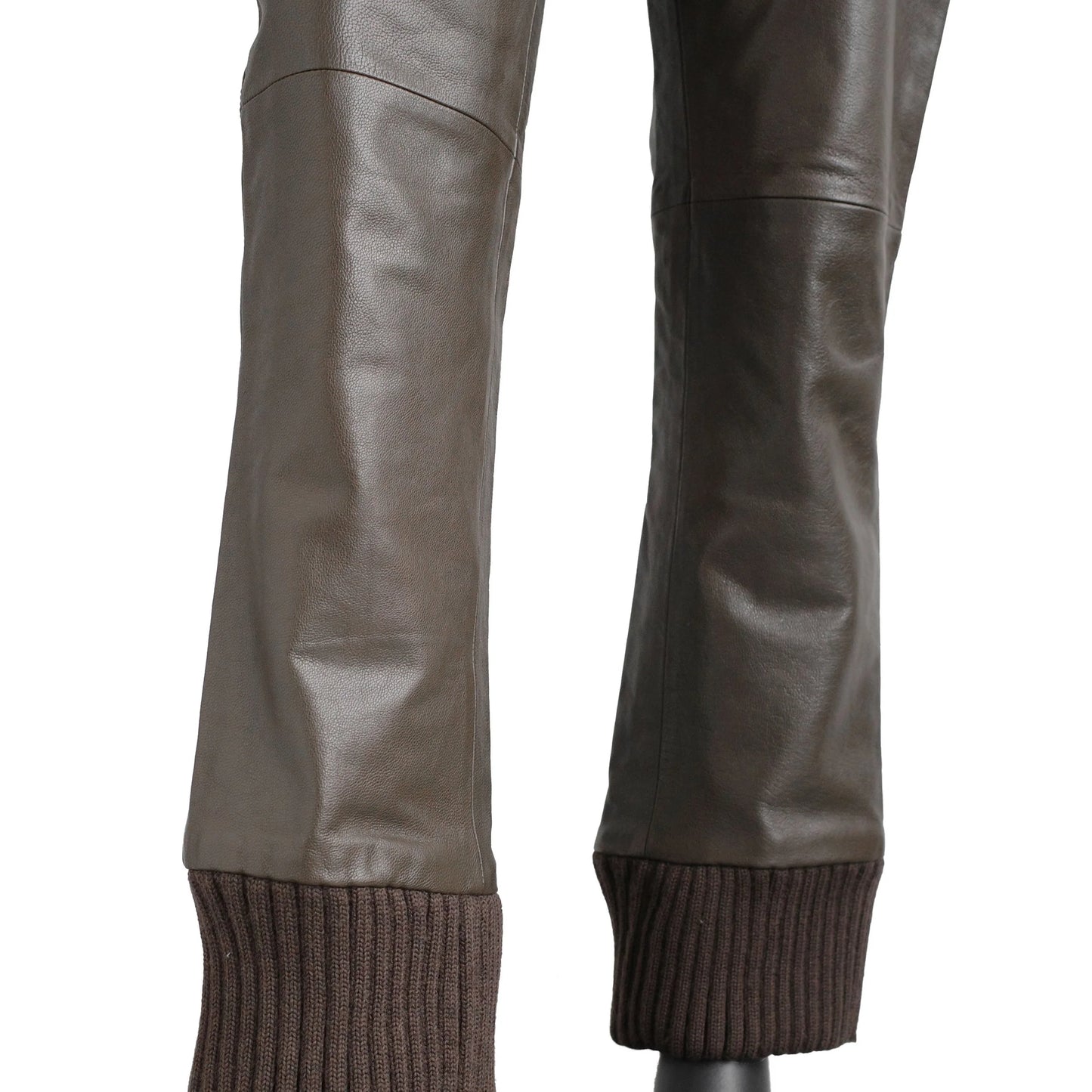 https://images.squarespace-cdn.com/content/v1/673cad159307f210013ba2f7/853fe9fe-6b6b-40eb-a377-93c27899a930/MiuMiu_FW1999_LeatherKnitCuffTrousers_5.jpg
