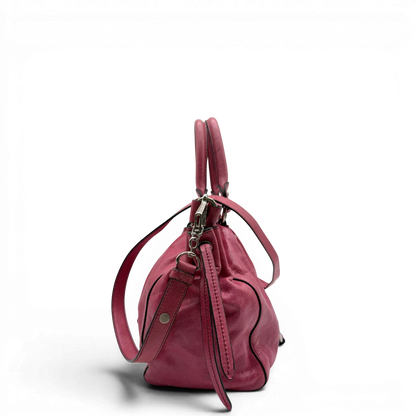 https://cdn.shopify.com/s/files/1/0564/9376/8855/files/Miu_Miu_Handtasche_Vitello_Lux_mit_Umhangegurt_aus_Leder_pink_vintage7948.webp?v=1779965633