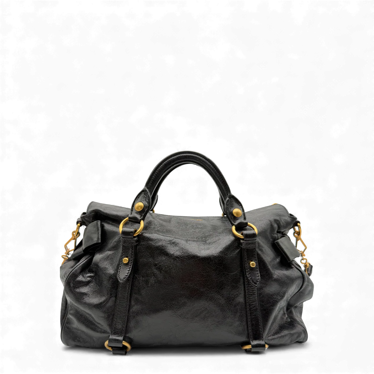 https://cdn.shopify.com/s/files/1/0564/9376/8855/files/Miu_Miu_Handtasche_Vitello_Satchel_aus_Leder_schwarz_vintage_handbag3062.webp?v=1764855354