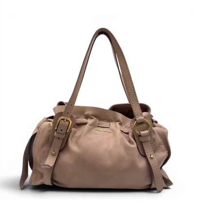 https://cdn.shopify.com/s/files/1/0564/9376/8855/files/Miu_Miu_Schultertasche_Ribbon_aus_Leder_rosa_vintage7602.webp?v=1779290194