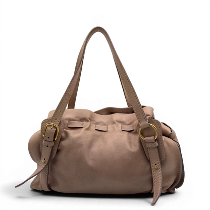 https://cdn.shopify.com/s/files/1/0564/9376/8855/files/Miu_Miu_Schultertasche_Ribbon_aus_Leder_rosa_vintage7603.webp?v=1779290193