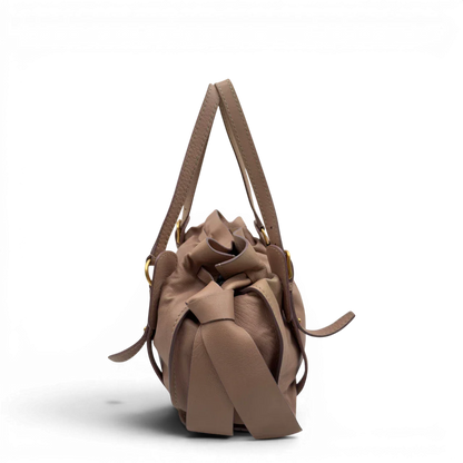 https://cdn.shopify.com/s/files/1/0564/9376/8855/files/Miu_Miu_Schultertasche_Ribbon_aus_Leder_rosa_vintage7604.webp?v=1779290193