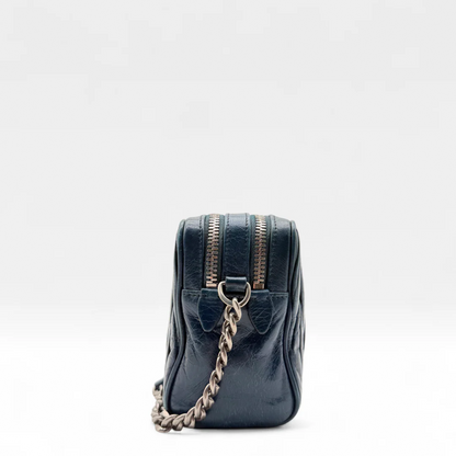https://cdn.shopify.com/s/files/1/0564/9376/8855/files/Miu_Miu_Umhangetasche_Matelasse_aus_Leder_marineblau_vintage_crossbody6963.webp?v=1758891102